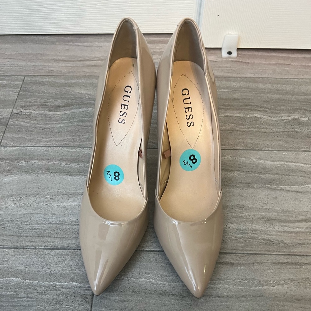 Elegant tan high heel by Guess, size 8.5